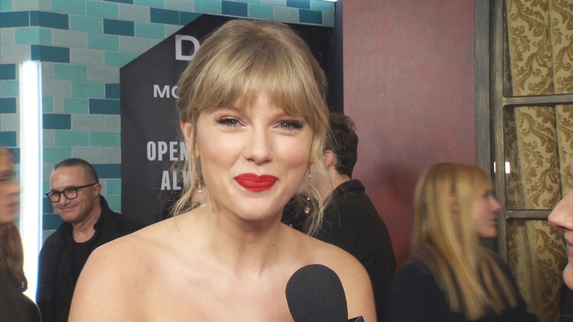 See Taylor Swift Drink Milk From A Giant Saucer In Cat School Video E Online